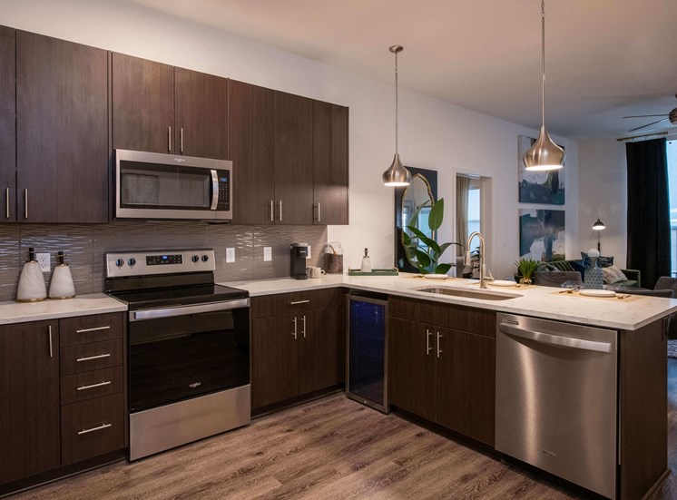 kitchen with brown cabinets and stainless steel appliances